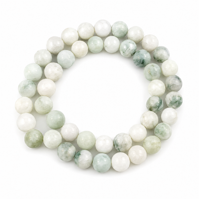 Jade Perlenstrang aus Naturstein mit runden Edelsteinperlen in Weiß und Mintgrün für Schmuckherstellung und DIY-Armbänder.